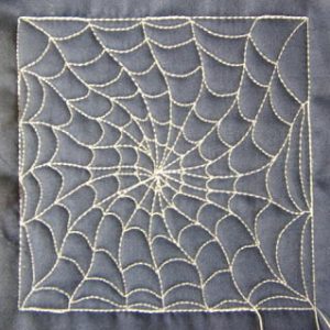 Halloween spider web quilt design