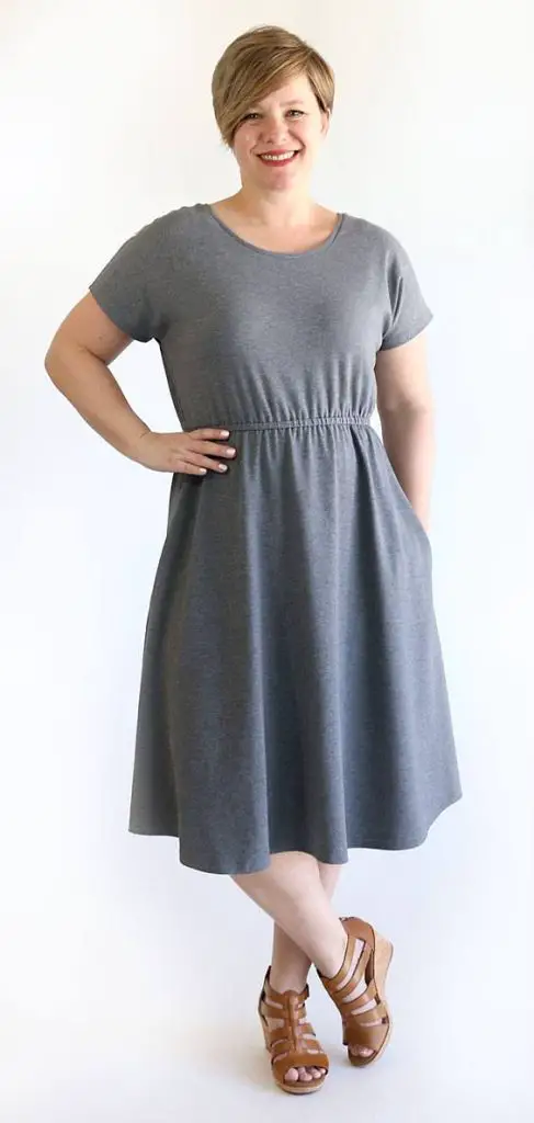 woman fashioning the everyday dress pattern she has created
