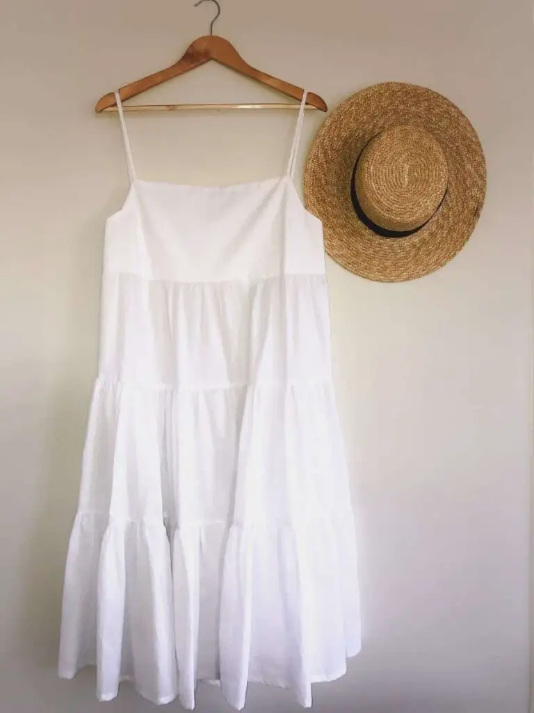 beginner friendly free plus-size dress pattern hanging with a cute matching hat